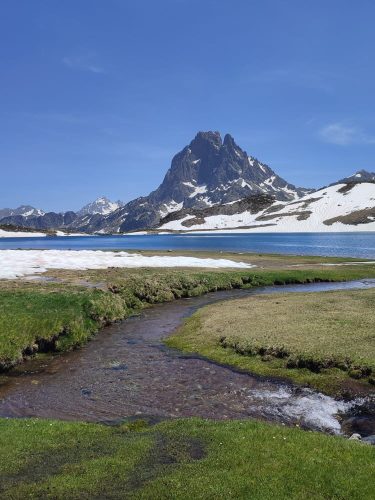 Mountain lake and stream below the Pic du Midi d’Ossau in the French Pyrenees
